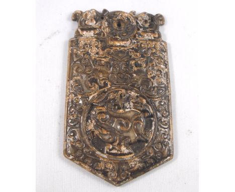 A Chinese jade plaque decorated dragon and foliate scrolls, possibly Han dynasty 9.5cm high 