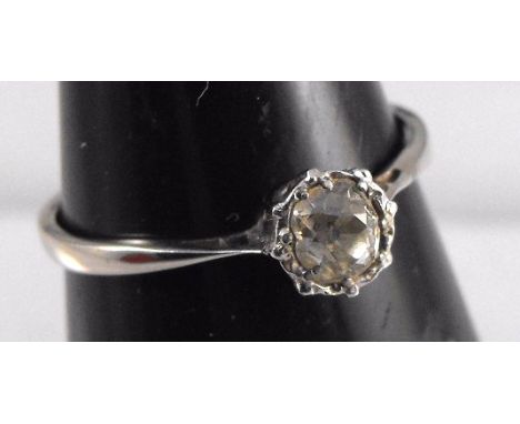 A white metal diamond solitaire ring 