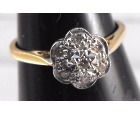 An 18ct gold cluster ring 