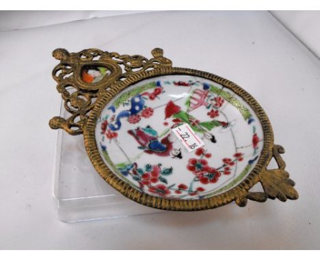 A 19thC Chinese Famille Rose Dish decorated figures in enamel colours in later ormolu mount 14cm diameter  