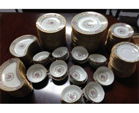 A Haviland Limoges dinner service decorated with flowers and garlands with gilt highlights (large quantity) Condition ReportV