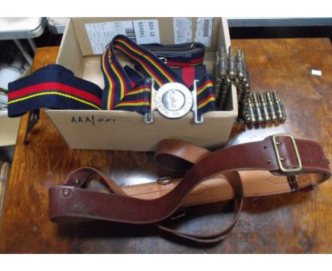 Military. Sam Browne leather belt with four Army Stable Belts and a bullet belt