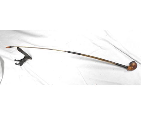An 18th/19thC two section pipe made from a herons leg bone with white metal mounts 81cm high