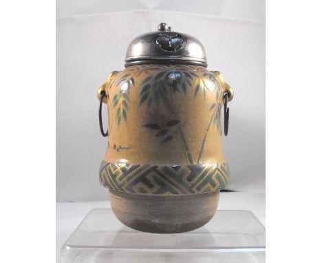 A 19thC Japanese pottery censer decorated enamel colours with a crane having a pierced silver top with a Mon 13cm high 