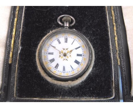 An Edwardian open faced fob watch Sheffield, 1904 the enamel dial having Roman numerals, boxed, 3cm diameter  