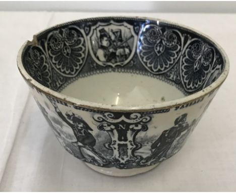 A 19th century transfer printed ceramic bowl with Napoleonic scenes (a/f).  