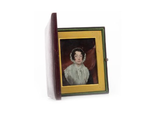 VICTORIAN PORTRAIT MINIATURE OF A YOUNG LADYon ivory, 8.5cm x 6.5cm, mounted, under glass, in a hinged Morocco case