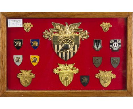 TWO FRAMED DISPLAYS OF UNITED STATES ARMY BADGESincluding gilt and enamel examples relating to the Marine Corps and West Poin