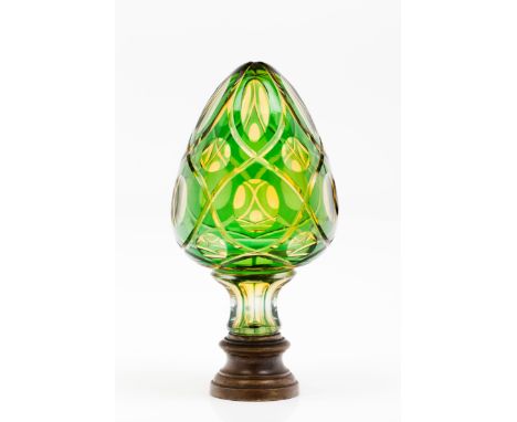 A newel post finialGreen glass with mirrored and gilt interiorFaceted decorationMetal mountLenght: 21 cm 