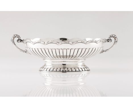 An oval fruit bowlSilver 800/000Gadrooned and reliefs decorationAustria assay warrantee mark (post-1922)(signs of wear)10x28x