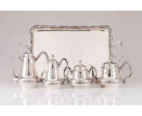 A tea and coffee setSilver 833/000Reliefs frieze of laurel leavesEngraved monogrammed centreComprising of tray, teapot, coffe