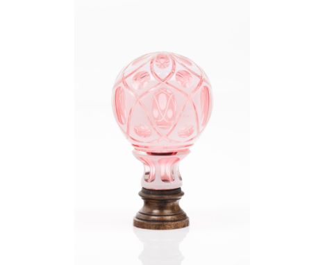 A newel post finialColourless and pink glassFaceted decorationMetal mountLenght: 16 cm 