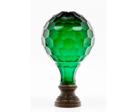 A large newel post finialGreen glassFaceted decorationMetal mountLenght: 23 cm 