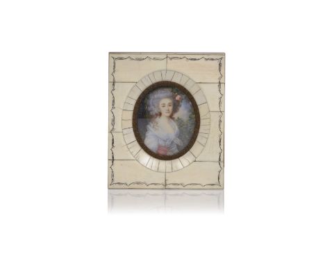 A portrait of a ladyOval miniature on ivoryWith an ivory veneered frameMetal hoopEurope, 19th century(unidentified author)12,