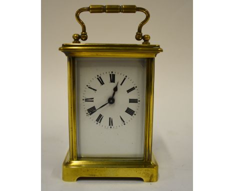 A French brass carriage clock with keyless movement and enamel dial, 14 cm high overall Condition Report The clock is not wor