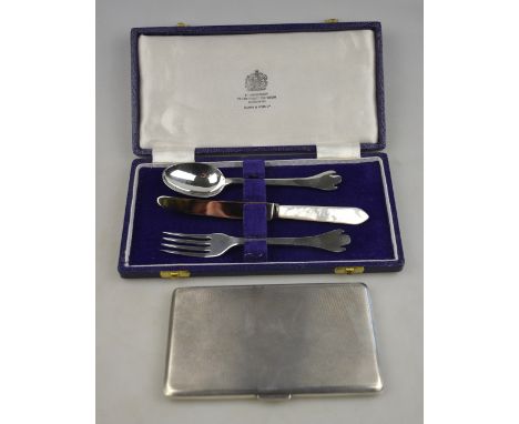 A heavy quality engine-turned cigarette case, W. H. Manton Ltd., Birmingham 1946, 6.5 oz, to/w a cased Christening spoon and 