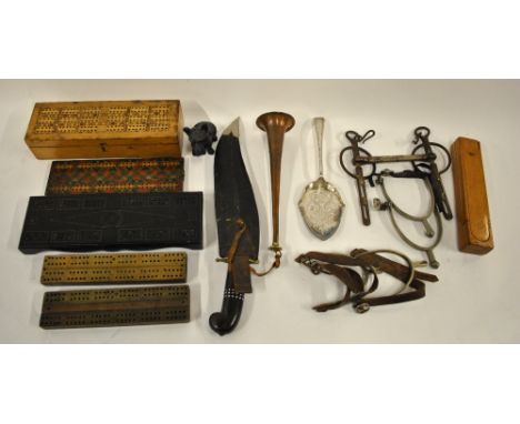 An Indian hunting knife with recurved blade and pistol-grip handle, in leather sheath, to/w a copper huntsman's horn, bit, th