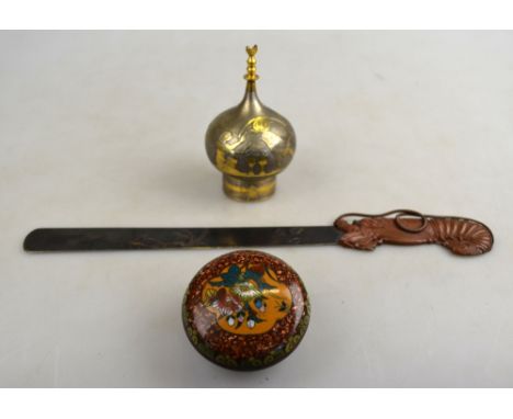 A Japanese globular metal scent bottle decorated with Egyptian figures and hieroglyphics, Mount Fuji mark to base, 9.5 cm to/