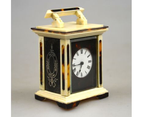 A French ivory and tortoiseshell carriage clock with 32 mm circular enamel dial, the sides with silver pique-work, 11 cm high