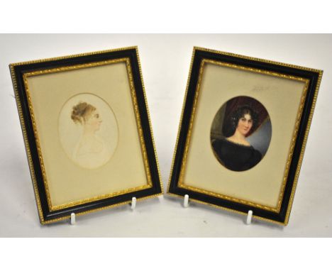 An early Victorian and oval portrait miniature of a lady with curled hair and black dress, to/w a Regency watercolour profile