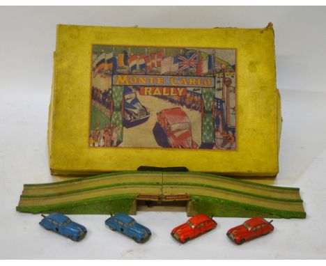 A German Arnold 'Primal' tinplate sedan car with remote control, to/w a Tri-ang Minic clockwork car, a clockwork 'Gama Tank' 