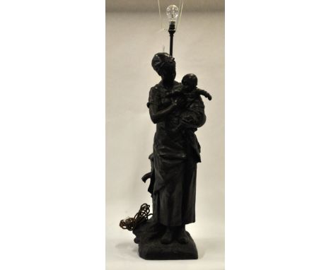 A large bronzed spelter figural lamp, modelled as a mother and child beside a village pump, signed 'Steiner', 87 cm high (not
