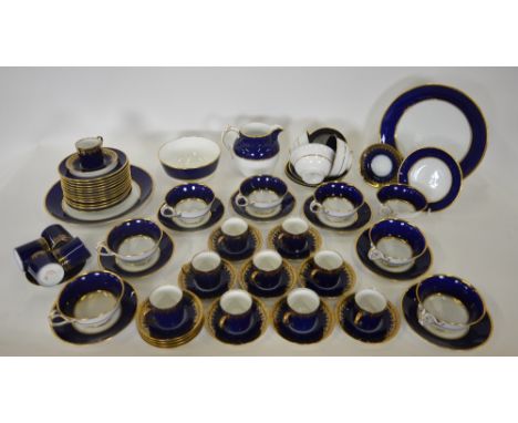 A Copelands Spode tea service decorated with a wide blue band and gilt bands comprising 12 x cups, 12 x saucers, 12 x tea pla