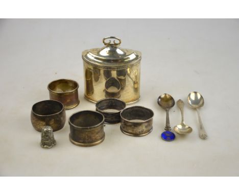 A silver navette tea caddy, Birmingham 1920, to/w five napkin rings, three teaspoons, a toothpick and an unmarked thimble