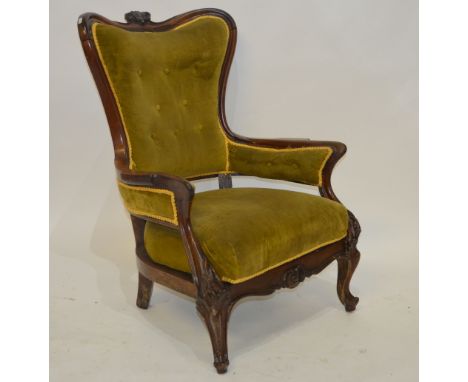 A Victorian rosewood show framed button backed armchair