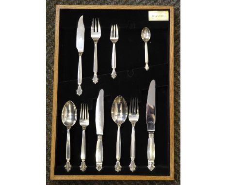 A Georg Jensen silver 'Acanthus' pattern ten-piece place setting with stainless steel blades - modern mark (lacks small fork)