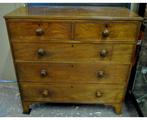 A George III mahogany chest of two short over three long graduated drawers, raised on shaped bracket feet, 108 cm w. x 49.5 c