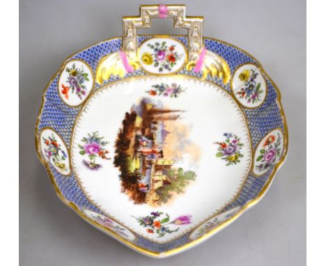 An early 19th century Berlin porcelain leaf shaped dish finely painted in enamels depicting figures on a river quayside, set 