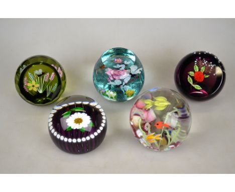 Five Caithness glass paperweights - Carnation, Flying Fish, Double Dragonfly, Royal Flourish and Dragonfly, all limited editi
