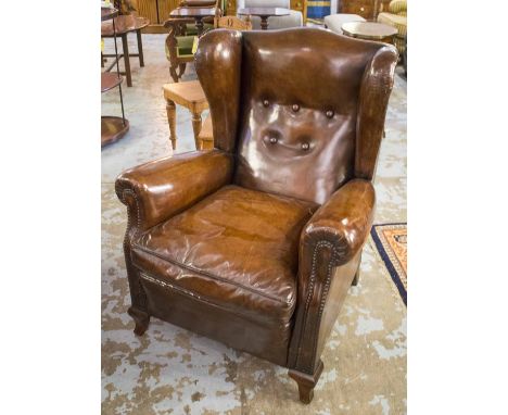 WINGBACK ARMCHAIRS, a pair, brass studded and button upholstered leaf brown leather and shaped supports, 81cm W. (2)