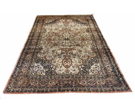 FINE PURE SILK TEHRAN DESIGN CARPET, 317cm x 209cm, central medallion on a palmette and vine field, within corresponding span