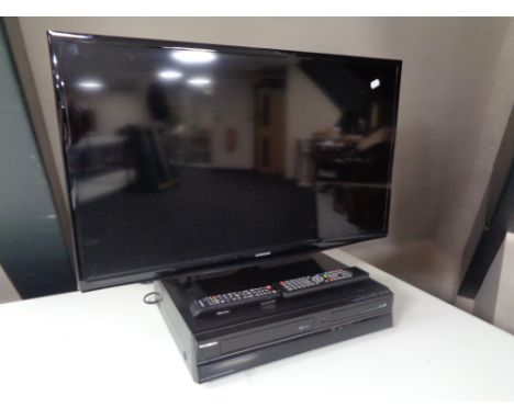 A Samsung 32'' LCD TV with remote together with a Toshiba DVD/ Video cassette recorder with remote  