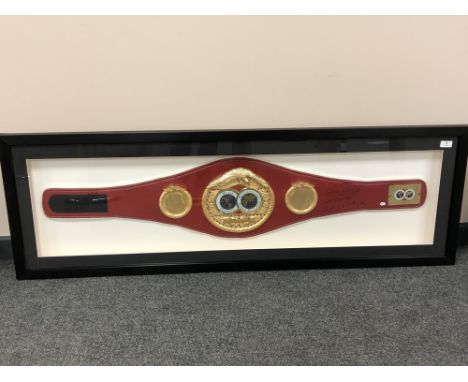 A sporting memorabilia montage : A replica IBF World Champion boxing belt signed by Gennady Golovkin, 148 x 48.5 cm, with cer