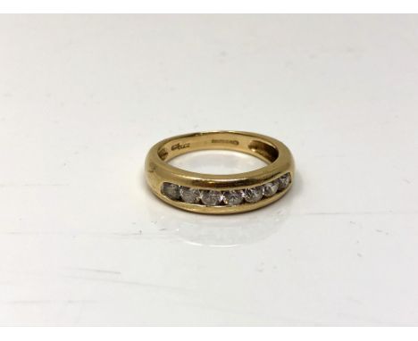 A 14ct gold cubic zirconia half eternity ring, size O.  CONDITION REPORT: 4.3g