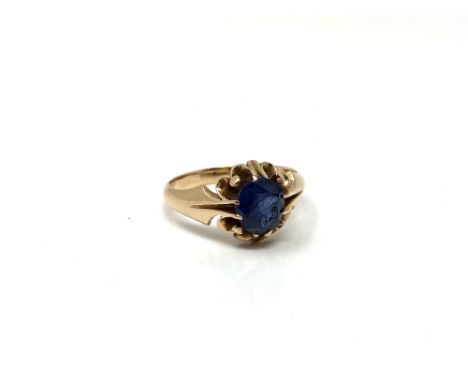 A gold sapphire solitaire ring, size N. CONDITION REPORT: Unmarked, 4.2g. 