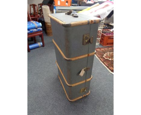 An early 20th century wooden bound travelling trunk 