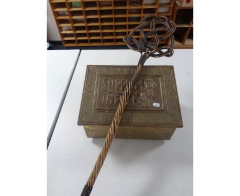 A brass embossed slipper box together with a carpet beater 