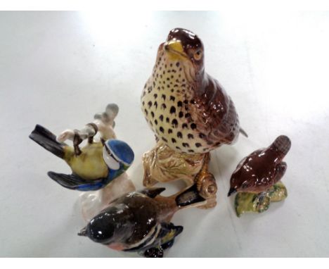 A Beswick figure of a thrush No. 2308, together with two further Beswick figures, Chaffinch and Wren, and a Goebel figure of 