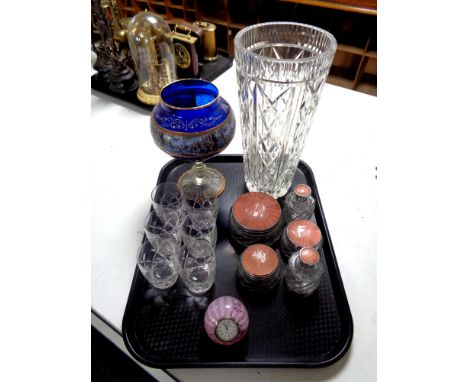 A tray containing assorted glassware to include a Venetian blue glass goblet, lead crystal vase, assorted perfume bottles, Ca