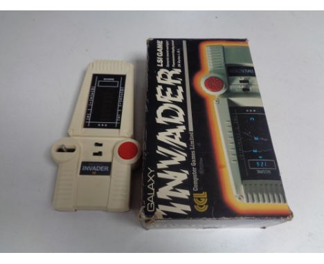 A vintage CGL Galaxy invader LSI game, boxed 