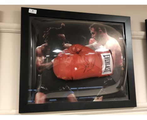A sporting memorabilia montage : A signed red Everlast boxing glove, Steve Collins, with certificate of authenticity from Mon