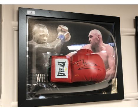 A sporting memorabilia montage : A signed red Everlast boxing glove, Tyson Fury , with certificate of authenticity from Monta