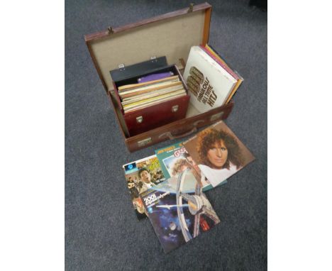 A vintage leather luggage case containing case of LPs to include compilations, musicals, classical etc   