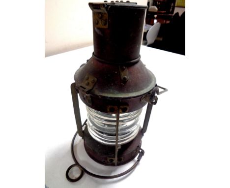 A copper ship's lamp  