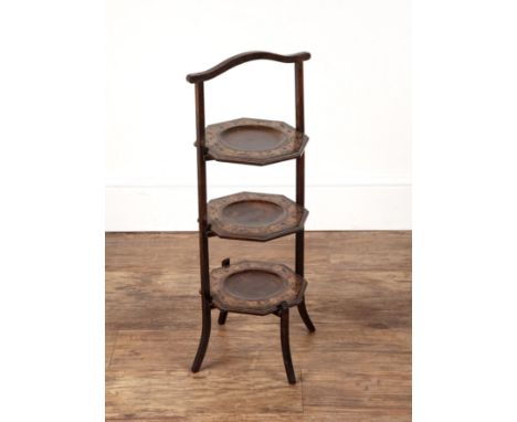 Poker work cake standof three octagonal tiers, 76cm high  With some wear and marks.
