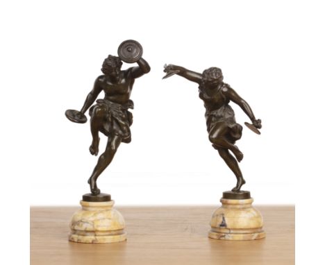 Ernest Rancoulet (French, 1842-1918) two neoclassical bronze statuettes depicting a male and a female figure dancing with cym